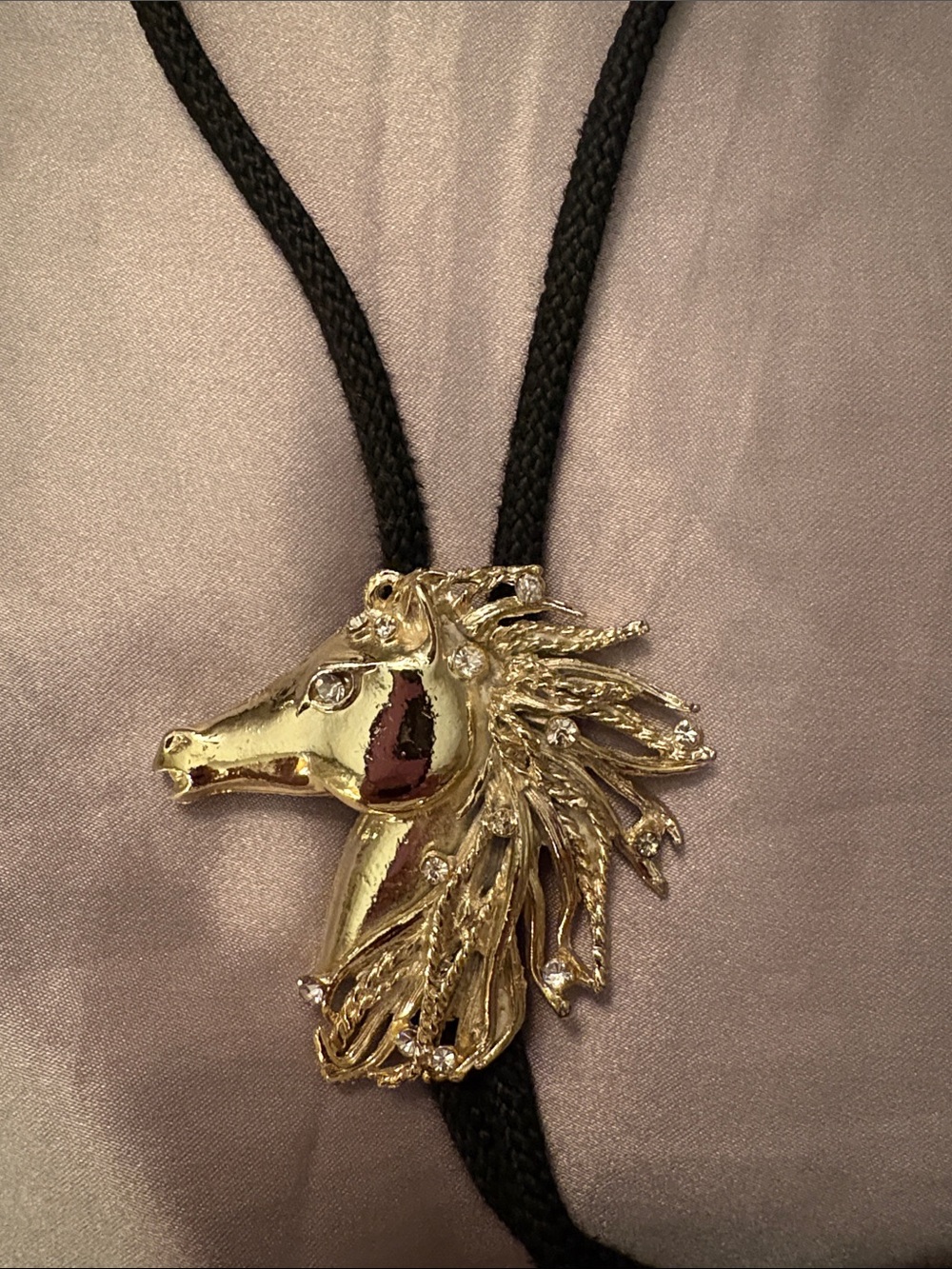 Gold Horse Head Bolo Tie with Black Braided Cord